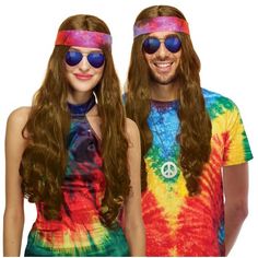 Make your costume totally far out with the Way To Celebrate Halloween Hippie Costume Wig with Bandana. This wig features long wavy locks with a colorful tie-dye bandana tied around it, making it the perfect accessory to complete your '70s costume. Pair this groovy wig with a pair of bell-bottom jeans, a funky shirt, and your best pair of platform shoes for a slammin' hippie costume. You can even use this wig again next Halloween or for a decades' party. Be sure to check out other Way To Celebrate costumes and accessories like bracelets, costume kits, accessory kits, tights, and more for a fun and spooky All Hallows' Eve. Complete the look of your Halloween costume with the Way To Celebrate Halloween Hippie Costume Wig with Bandana. Color: Brown. Cheap Novelty Costume Accessories For Birthdays, Party City Wigs Costumes, Hippie Wigs, Halloween Hippie Costume, Late 60s Fashion, 70s Costume, Tie Dye Bandanas, Wig Brown, Funky Shirts