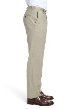 Stretch-infused wool gabardine defines handsome trousers crafted in a crisp, versatile flat-front cut. 16 1/2" leg opening; 9 1/4" front rise; 14 3/4" back rise Zip fly with button-tab closure Slant pockets; back button-closure welt pockets Unhemmed. These trousers can be hemmed for free at your local Nordstrom. Find a store Lined to the knee 98% wool, 2% spandex Dry clean Imported Men's Clothing Wool Trousers, Black Flats, Modern Fit, Welt Pocket, The Knee, Men's Clothing, Khaki Pants, Nordstrom, Trousers