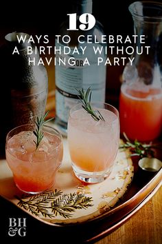 two cocktails on a tray with rosemary garnish in them and the words, 19 ways to celebrate a birthday without having a party