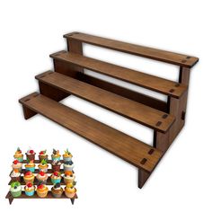 three tiered wooden display with cupcakes on each shelf and an image of the bottom