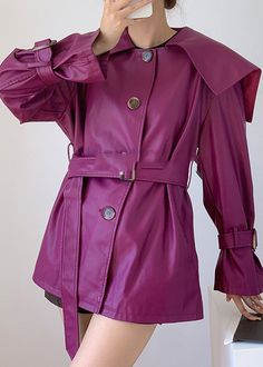 Purple Patchwork Faux Leather Trench Peter Pan Collar Button FallFabric: Faux LeatherSize & Fit: Fit: This garment fits true to size.Length: Size 2XL measures 28.08"from shoulder to hemBust: Great for any cup size. Waist: Loose Fit. Comfortable room throughout midsection.Hip: Loose Fit - room for hips. Hand Wash Cold. Solid Faux Leather Outerwear With Button Closure, Retro Fall Outerwear With Covered Buttons, Retro Outerwear With Covered Buttons For Fall, Trendy Double-breasted Faux Leather Outerwear, Spring Faux Leather Outerwear With Snap Buttons, Fall Purple, Leather Trench, Fall Fabric, Comfortable Room