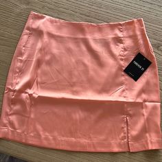 Pink / Peach Satin Mini Skirt Pink Satin Mini Skirt, Layered Mini Skirt, Satin Mini Skirt, Forever 21 Skirt, Tan Skirt, Flared Mini Skirt, Green Mini Skirt, White Mini Skirt, Studded Jeans