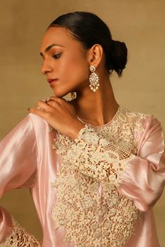 Powder pink short kurta with cutwork embroidery on yoke and cuffs. Paired with a plain harem pant. - Aza Fashions Feminine Festive Sets With Chikankari Embroidery, Festive Feminine Sets With Chikankari Embroidery, Feminine Chikankari Embroidery Sets For Wedding, Eid Lace Sets, Lace Blouse With Resham Embroidery, Pink Cutwork Sets For Festive Occasions, Festive Feminine Chikankari Embroidery Sets, Elegant Pink Lace Work Sets, Festive Pink Kurta With Cutwork