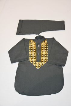 Description Colour: Black Fabric: 100% Cotton Dress Front: Embroidery  This is a handmade outfit for infant, toddler and kid boys. It includes a top and bottom with machine embroidery front. It would be an ideal outfit for occasions such as birthdays, Eid and Weddings or a perfect gift. Available in sizes:  *3-6 months *6-9 months *12-18 months (1-1.5 years old) *18-24 months (1.5-2 years old) Top / Kurta  *Breathable and easy-to-wash cotton fabric *Easy open and close clasp-buttons *No-itch col Fitted Lawn Suit With Multicolor Embroidery For Eid, Fitted Multicolor Embroidered Lawn Suit For Eid, Fitted Long Sleeve Kurta With Handwork, Fitted Cotton Lawn Suit With Dabka Work, Traditional Long Sleeve Diwali Wear With Handwork, Diwali Long Sleeve Traditional Wear With Handwork, Diwali Traditional Long Sleeve Wear With Handwork, Cotton Sets For Traditional Ceremonies, Fitted Cotton Salwar Kameez With Dabka