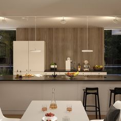 the kitchen is clean and ready to be used as a dining room or office space