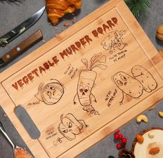 a wooden cutting board with cartoon characters on it