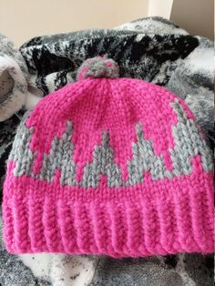 NEW.. Just had these made New for the upcoming winter as they are in high demand..First Nations Hand Knit Cowichan Wool Native Hat Pink and Grey , Aztec Design.. has an option to wear folded up with a rim.. Size Medium UNISEX.. Great Christmas Gift Idea! .. in good clean condition..NEW.. nice warm thick wool... 9.5 inches high from the rim ( Without the rim folded up) 20 inches around the bottom rim.. it has quite a bit of stretch to it.. Warm Pink Knit Hat, Winter Knitting Patterns With Yarn, Winter Hand-knitted Pink Crochet Hat, Hand Knitted Pink Crochet Hat For Winter, Pink Winter Hat Made Of Yarn, Winter Handmade Pink Crochet Hat, Pink Crochet Winter Hat, Winter Pink Crochet Hat, Winter Knitting Patterns With Acrylic Yarn