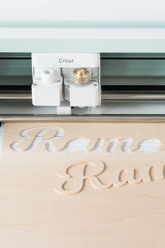 an image of a sign that says ramon rano next to a machine with the word ramon rano printed on it