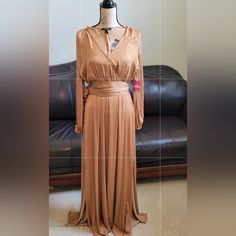 Forever 21 Maxi Dress Caramel Colored With Long Sleeves, Elastic At Wrist. Elastic Also At Waist With V Cross Over Front And Long Belt. Optional. Slits On Both Sides In Front. Size Small Flowy Brown Maxi Dress For Party, Brown Flowy Maxi Dress For Party, Forever 21 Elegant Fitted Maxi Dress, Elegant Fitted Maxi Dress By Forever 21, Elegant Maxi Dress By Forever 21, Forever 21 Elegant Maxi Dress, Elegant Forever 21 Maxi Dress, Forever 21 Fitted Maxi Dress, Styling Maxi Dresses