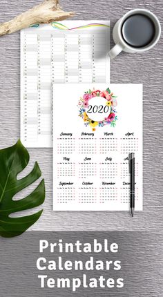 the printable calendar is displayed next to a cup of coffee and a plant on a table