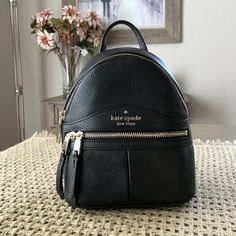 Kate Spade Karina Mini Convertible Backpack Bag Black Leather $329. Price Is Strictly Firm Details 8.7"H X 6.7"W X 3.6"D Pebbled Leather Lining: 2 Way Spade Jacquard Metal Pinmount Logo Zip Around Closure Interior Back Slip Pocket Exterior Front Zip Pocket Imported Style # Wkru7056 Kate Spade Backpack With Detachable Strap For Errands, Chic Kate Spade Leather Backpack With Detachable Strap, Kate Spade Standard Backpack With Detachable Strap, Kate Spade Leather Backpack With Detachable Strap For On-the-go, Kate Spade Chic Backpack With Detachable Strap, Kate Spade Leather Backpack With Detachable Strap, Chic Kate Spade Leather Backpack With Removable Pouch, Chic Kate Spade Backpack With Detachable Strap, Chic Kate Spade Leather Backpack For Errands