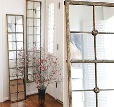 two mirrors and a vase with flowers in it