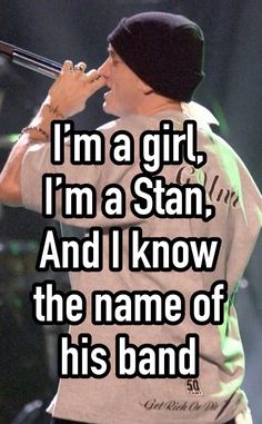 a man holding a microphone in his hand with the words i'm a girl, i'm a star, and i know the name of his band