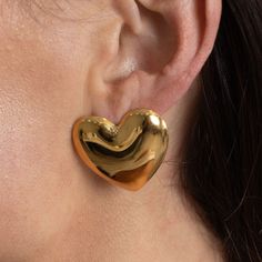 Get ready to make a statement with these Heart Statement Earrings! With their playful heart-shaped design, these earrings are perfect for adding a touch of fun to any outfit. Show off your quirky side and let these earrings do the talking. 18k Gold Plated over Stainless Steel Hypoallergenic Water & Tarnish Resistant Silver Statement Earrings, Sunglass Chain, Gold Statement Earrings, Jewelry Studio, Original Gift, Cz Stone, Ring Bracelet, Jewelry Care, Body Jewelry