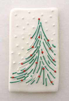 a cookie decorated like a christmas tree