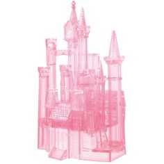 a pink plastic model of a city with tall buildings and spires on the top