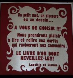 a red and white sign with words written in french on the bottom right side of it