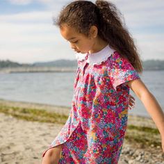 The Fae dress is a sweet straight cut dress with a gentle drape and front buttons. It features a broad collar in a white eyelet fabric and short sleeves with a slight puff. The dresses this season are in the signature bright prints in pink and yellow, both of which create a striking contrast and look lovely with the broderie collar. | Beet World | Fae Broad Collar Straight Cut Dress, Orchid (Multicolor, Size 12-18M) | Maisonette collects the best children’s products from around the world (unlike Fae Dress, Straight Cut Dress, Bright Prints, The Fae, Flowy Design, Sleepwear Dress, Eyelet Fabric, Cut Dress, Boy Accessories