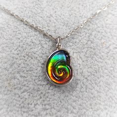 Ammolite stone size：13x10mm Expensive Jewellery, Ammolite Jewelry, Rose Gold Pendant, Expensive Jewelry, Silver Plated Jewelry, Alberta Canada, Silver Pendants, Sterling Silver Studs, Sterling Silver Earrings Studs