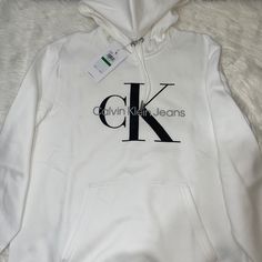 Calvin Klein White Fleece Hoodie With Black And Gray Logo. Nwt Calvin Klein Svg Free, Calvin Klein Sweatshirt, Calvin Klein Hoodie, Calvin Klien, Clavin Klein, White Crewneck Sweatshirt, Brown Sweatshirt, White Fleece, Calvin Klein White