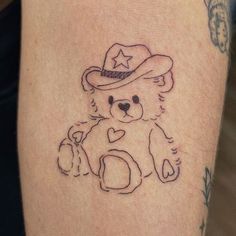 a drawing of a teddy bear with a hat on it's head