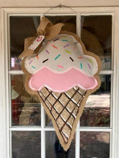 an ice cream sundae hanging on the front door