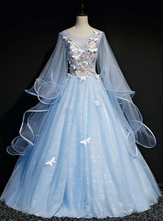 A beautiful dress is a blessing; we should try to get this blessing because it helps us to tell others about our common attitude towards life. Sky blue dress with fine artwork is the output that we received after the hard work of a long time. There are multiple features of the dress; for example, it is rightly prepared with the ball gown style, which unique due to the likeness of the ladies; we all know what the importance of the ball gown design is, particularly near the ladies. Series of designs are available in the present dress, for example, simple scoop design of neckline, sleeveless designs of sleeves. The beauty of the dress is not something that is ordinary and cannot be discussed. Sweet 16 Dresses Blue, Blue Sweet 16, Prom Dress Blue, Blue Ball Gowns, Tulle Evening Dress, Lace Ball Gowns, Long Prom Gowns, Blue Tulle, Tulle Ball Gown