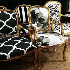 several chairs with black and white designs on them