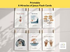 a bunch of cards that are hanging on a clothes line with the words printable 8 minutes of jesus flash cards