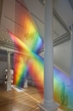 an art installation in a museum with rainbow colors