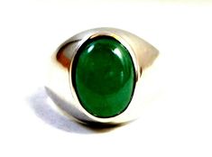 This Beautiful Ring is embedded with all Natural EMERALD in 925 Sterling Silver with a Virtual CERTIFICATE OF AUTHENTICITY OF THE GEMSTONE & SILVER. We have all Sizes Available and always welcome Customizations. Your item will arrive in a Cute Velvet box with absolutely FREE SHIPPING. 💎 Gemstone: Natural Emerald 💎 Base Material: Solid Sterling Silver (925) 💎 Stamps / Markings: 925 - Each stone has different markings and tones reminding you that not only is this truly a piece of the earth but Green Emerald Cabochon Rings, Classic Green Cabochon Emerald Ring, Silver Cabochon Emerald Ring For May Birthstone, Silver Emerald Cabochon Ring, Luxury Silver Cabochon Emerald Ring, Emerald Cabochon, Cabochon Ring, Ring Setting, Green Emerald