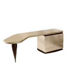 a modern desk with an unusual shaped top and gold leaf design on the front, against a white background