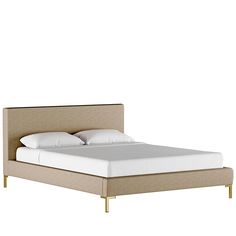 an image of a bed with white sheets and beige linens on the headboard