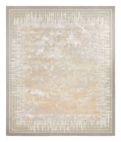 an area rug with white and beige colors