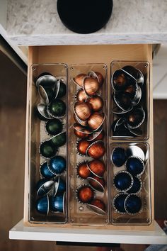 an open drawer with several different types of food in it