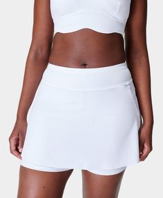 A multi-functional performance skort. Sweat-wicking fabric with lightweight and breathable over skirt. Supportive inner shorts. Inseam length: 5" / 12cm. Skirt length: 26.4cm from underband to hem. Model wears size S and is 178cm/5'10" tall. Style Code: SB2478Colour: White Tennis Mini Skirt With Built-in Shorts, Stretch Nylon Skirt With Built-in Shorts, Stretch Mini Skirt With Built-in Shorts For Tennis, 4-way Stretch Skort With Built-in Shorts, Sporty Skort With 4-way Stretch And Built-in Shorts, Tennis Skort With Built-in Shorts, Functional Swim Skirt With Built-in Shorts For Summer, Sporty Mini Skirt With Short Inseam For Sports, Sporty Swim Skirt With 4-way Stretch And Built-in Shorts