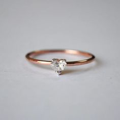 "Colorless Moissanite Diamond Engagement Ring 14K Rose Gold Prong Accent Wedding Ring Hear Cut Diamond Anniversary Gift Ring For Women  ✎ One note for our all lovely customers, the stone you saw in listed jewelry on our store which is only handmade and ordinary. which has been made by our skilled and professional tradesperson which is worthy ❖ Moissanite Details: ⇨ Shape: Heart ⇨ Color: Colorless ⇨ Clarity: VVS ⇨ Weight: 0.13 CT ⇨ Stone Dimension: 3.5 mm. ✎ Photos of particular listed jewelry wh 14k Rose Gold Diamond Ring For Valentine's Day, Delicate White Gold Ring For Proposal, Delicate White Gold Proposal Ring, Minimalist Rose Gold Cubic Zirconia Diamond Ring, Rose Gold Heart-shaped Ring With Brilliant Cut, Delicate White Rings For Proposal, Delicate White Ring For Proposal, Delicate White Proposal Ring, Heart-shaped Rose Gold Diamond Promise Ring