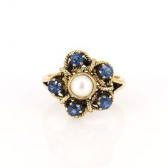 9ct Solid Gold Blue Sapphire Pearl Ring, Antique Style, 9k Yellow Gold Vintage Replica Womens Edwardian, Sapphire, Pearl Flower Design Ring This beautiful Victorian ring is an excellent example of goldsmith work during this period. Superb jewellery was crafted during Victorian/Edwardian times, displaying a beautiful, timeless design and craftsmanship. The ring is hallmarked for 9ct gold. This beautiful old ring style is from 1900 century , it is in lovely condition. The beautiful band and settin Victorian Style Gold Sapphire Ring, Victorian Gold Sapphire Ring As Gift, Victorian Sapphire Jewelry In Gold, Victorian Gold Sapphire Ring With Diamond, Edwardian Sapphire Ring, Sapphire Jewelry Set, Old Rings, Victorian Pendants, Gold Jewelry Sets