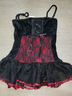 This is a girls Halloween costume in a size 4 to 6. The length from the top of the shoulders to the bottom edge is 21 inches. gently worn, clean! great for pretend play, too! All of our items are from a smoke free home. we do our best to describe them as we see them. if for any reason you are not pleased with an item, please let us know. we do NOT refund s/h fees for any reason, as we cannot get it back from the post office. We ship monday thru friday, within 24 hours of rec'g payment. if you do Halloween Themed Clothes, Lydia Deetz Dress, Goth Halloween Costume, Character Customization, Girls Halloween, Dress Halloween Costume, Halloween Costumes For Girls, Style Mistakes, Halloween Girl