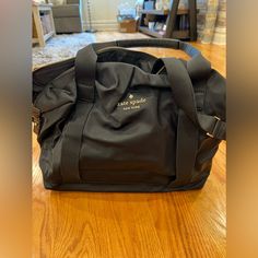 Kate Spade Duffle Bag. Medium Size And Fits A Large Amount! Nylon Material And Comes With Crossbody Strap. Bags Kate Spade, Kate Spade Bags, Kate Spade Bag, Crossbody Strap, Travel Bags, Medium Size, Duffle Bag, Kate Spade, Bag Lady