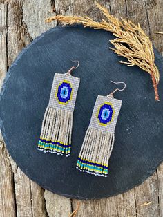 Evil eye beaded earrings, abstract beaded earrings,Handwoven beaded earrings, long modern earrings, abstract earrings, fringe earrings ♥𝑇ℎ𝑒 𝑝𝑎𝑡𝑡𝑒𝑟𝑛 𝑜𝑓 𝑡ℎ𝑖𝑠 𝑒𝑎𝑟𝑟𝑖𝑛𝑔 𝑖𝑠 𝑐𝑟𝑒𝑎𝑡𝑒𝑑 𝑏𝑦 𝐻𝑊𝐵𝑒𝑎𝑑𝐽𝑒𝑤𝑒𝑙𝑟𝑦.  ♥𝑀𝑎𝑑𝑒 𝑢𝑠𝑖𝑛𝑔 𝑓𝑟𝑒𝑒ℎ𝑎𝑛𝑑 𝑏𝑒𝑎𝑑𝑖𝑛𝑔 𝑤𝑜𝑣𝑒𝑛 𝑡𝑒𝑐ℎ𝑛𝑖𝑞𝑢𝑒𝑠 𝑤𝑖𝑡ℎ 𝑠𝑡𝑟𝑜𝑛𝑔 𝑠𝑦𝑛𝑡ℎ𝑒𝑡𝑖𝑐 𝑡ℎ𝑟𝑒𝑎𝑑. ♥𝑇ℎ𝑒 𝑠𝑖𝑧𝑒 𝑜𝑓 𝑡ℎ𝑒 𝑠𝑒𝑒𝑑 𝑏𝑒𝑎𝑑𝑠 𝑢𝑠𝑒𝑑 𝑖𝑠 2 𝑚𝑖𝑙𝑙𝑖𝑚𝑒𝑡𝑒𝑟𝑠 𝑎𝑛𝑑 𝑏𝑒𝑎𝑑𝑠 𝑎𝑟𝑒 ℎ𝑖𝑔ℎ 𝑞𝑢𝑎𝑙 Spiritual Beaded Earrings, Evil Eye Beads Earrings, Evil Eye Fringe Earrings, Van Gogh Beaded Earrings, Bohemian Handwoven Brass Beaded Earrings, Abstract Earrings, Light Earrings, Fedora Hat, Modern Earrings