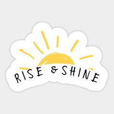 a sticker that says rise and shine with the sun in the sky behind it