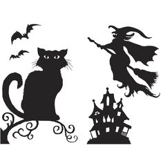 a black cat sitting on top of a table next to a witch's castle