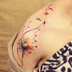 a woman's chest with flowers on it