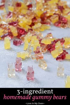 some gummy bears are laying on the ground with text overlay that reads, 3 ingredient homemade gummy bears love in my oven