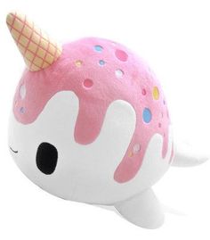 a pink stuffed animal with an ice cream cone on its head is laying in front of a white background