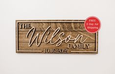 a wooden sign that says the wilson family on it