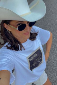 Cowgirls Needs Love Too obviously!! We love this new t-shirt for all fall country concerts coming up. Featuring the cutest white tee with a stamp of Cowgirls Need Love Too on the front. Model is wearing a Medium. Shirt runs TTS, size up for an oversized fit. All sales are final as they are made to order. Cowgirl Pictures, Fall Country, Country Concerts, White Tee, Need Love, New T, Equatorial Guinea, Mozambique, Laos