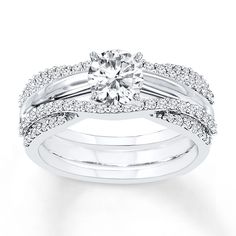 a white gold engagement ring and wedding band set