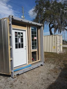 a portable home made out of shipping containers